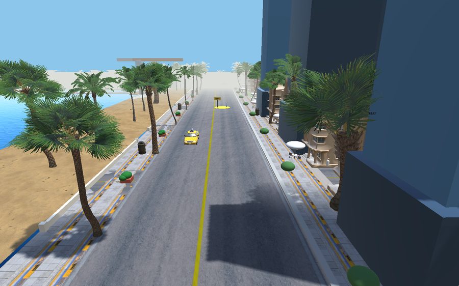 Uferstraße mit Palmen und Blick aufs Meer